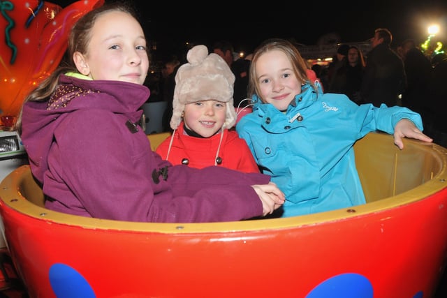 Aimee and Emily Lincoln with Helena Wyness on the rides at the Ashbrooke fireworks eight years ago.