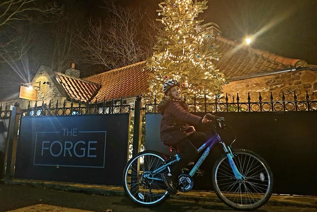 Enjoying a festive bike ride in Washington Village.