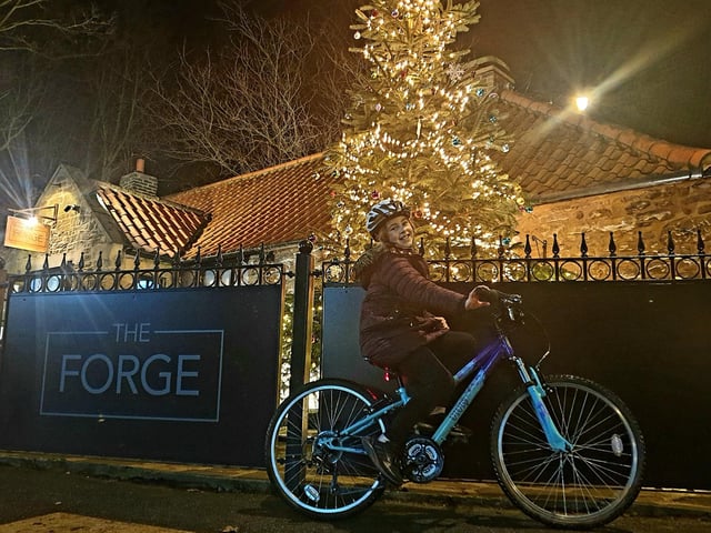 Enjoying a festive bike ride in Washington Village.