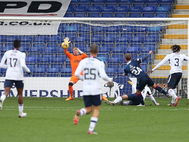 Beat out a first half effort from Paton and tipped over a second-half dangerous cross that almost crept in. Always ready for the infrequent Ross County attacks. (Photo by Paul Campbell/Getty Images)