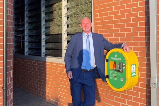 Brian Gill, general manager of Napoleons Casino Sheffield, in Hillsborough, with the life-saving defibrillator which has been installed there