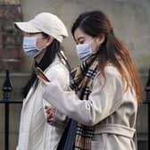 Many people are wearing masks in a bid to prevent the spread of coronavirus (Pic: Ian Forsyth/Getty Images)