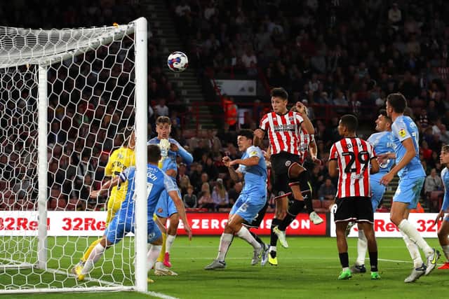 Anel Ahmedhodzic of Sheffield Utd (C) scores the opening goal during the Sky Bet Championship match at Bramall Lane. Picture: Lexy Ilsley / Sportimage