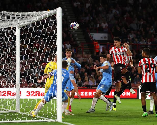 Anel Ahmedhodzic of Sheffield Utd (C) scores the opening goal during the Sky Bet Championship match at Bramall Lane. Picture: Lexy Ilsley / Sportimage