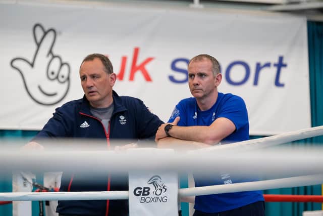 GB Boxing performance director Robert McCracken (left) watches over the athletes during a training session.