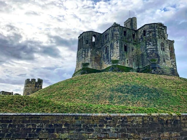 Warkworth Castle stands tall and proud.