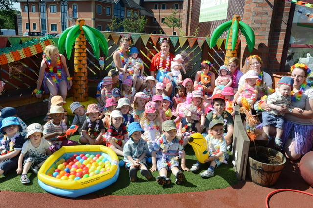 Staff and children at the Apple Blossom Day Nursery in Castletown, were having a beach themed party in this 2013 photo. Can you spot a familiar face?