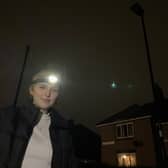 Coun Sophie Wilson used a head torch after streetlights went out in Arbourthorne