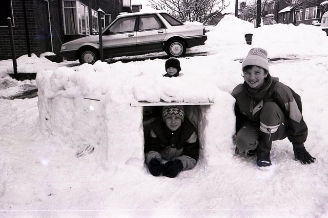 These children build an igloo in the deep snow in Sheffield in February 1991, but who are they?