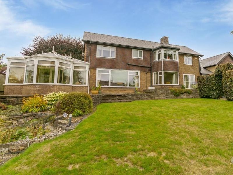As you can see, there is plenty of room at the back of the property. Not to mention a sloping lawn, greenery and rockery.