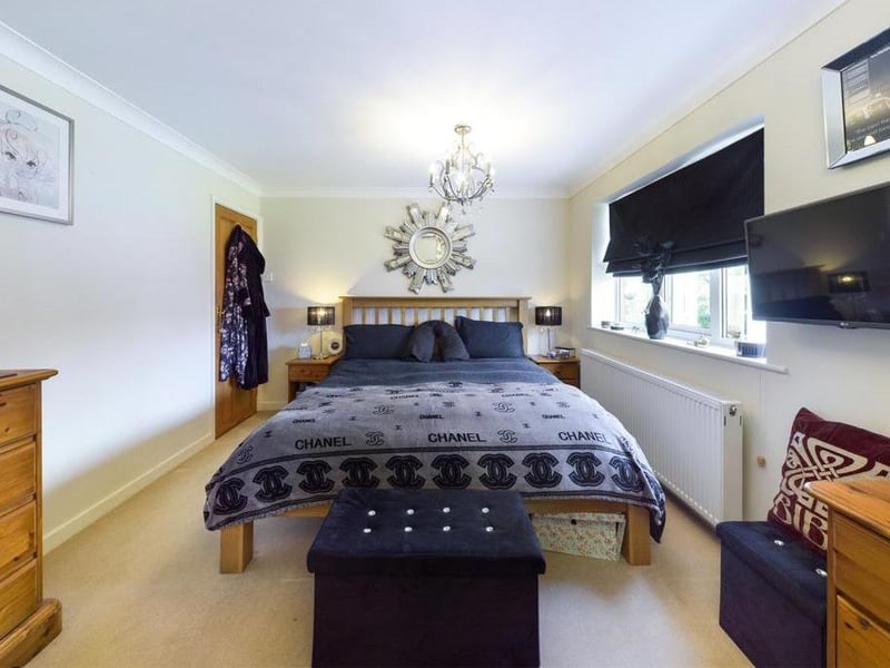 Master bedroom - Two uPVC double glazed windows to the rear elevation, ceiling coving, fitted wardrobe to one wall, T.V point, radiator panel and power points; door to en suite shower room.