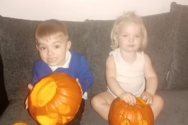 Showing off their pumpkins! Thanks to Zoiee Neesam for the photo.
