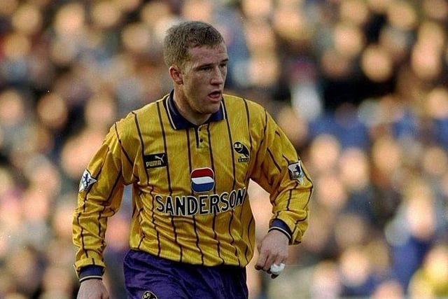 I don't think purple and gold have ever gone so well together... Mid-90s, this shirt with purple shirts and the old stylised owl, looks brilliant. Don't you think? (Mark Thompson/Allsport)