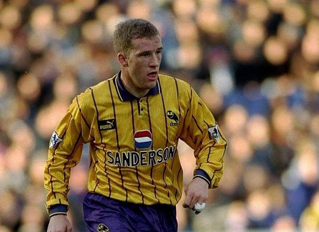 I don't think purple and gold have ever gone so well together... Mid-90s, this shirt with purple shirts and the old stylised owl, looks brilliant. Don't you think? (Mark Thompson/Allsport)