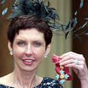 Bet365 Chief Executive Denise Coates poses with her Commander of the British Empire (CBE) medal. (Photo by Sean Dempsey - WPA Pool/Getty Images)