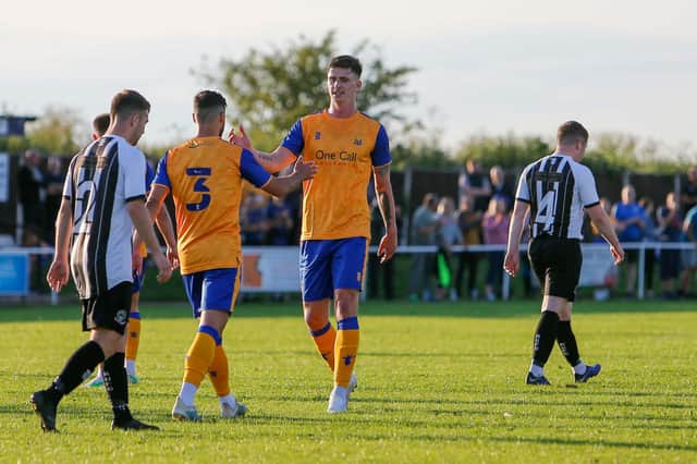 Mansfield Town's Oliver Hawkins celebrates his opening goal.
