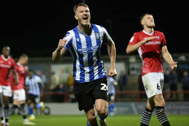Michael Smith claimed his first league goal for Sheffield Wednesday in their win at Morecambe.