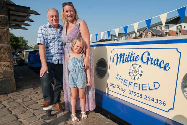 Mark and his late wife Melanie pictured with their granddaughter Millie Grace in 2013. Both Houseboat Hotels boats are named after the couple's grandchildren. Photo: Paul David Drabble
