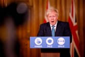 Boris Johnson speaks during a virtual press conference inside 10 Downing Street this afternoon (Photo by TOLGA AKMEN/AFP via Getty Images)