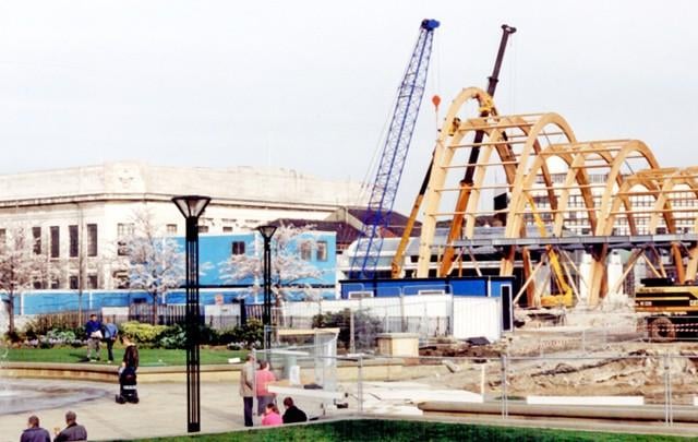 Cranes can be seen from the Peace Gardens as the wooden structure takes shape.