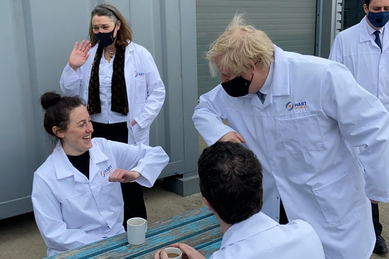 Boris Johnson exchanges pleasantries with Hart Biologicals' staff member Kensey Robinson.