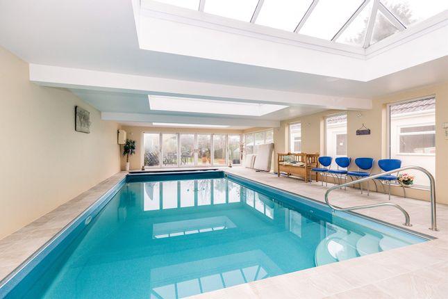 It has an indoor heated swimming pool.