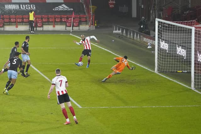 David McGoldrick of Sheffield Utd scoring during the Premier League match at Bramall Lane, Sheffield. Picture date: 3rd March 2021. Picture credit should read: Andrew Yates/Sportimage