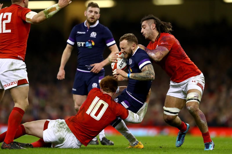 2018: Wales 34, Scotland 7
Substitute Peter Horne got a consolation 79th-minute try for Scotland but that was comprehensively outdone by their hosts' four tries, earning them their first-ever try bonus point. Pictured is  Byron McGuigan being tackled by Josh Navidi and Rhys Patchell during that Natwest Six Nations round-one match between Wales and Scotland at the Principality Stadium on February 3, 2018, in Cardiff.  (Photo by Michael Steele/Getty Images)