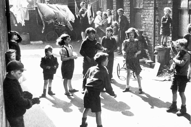 Children play in the street at Hope Square, off Brightside Lane area, now demolished.  Submitted by W J Pettigrew