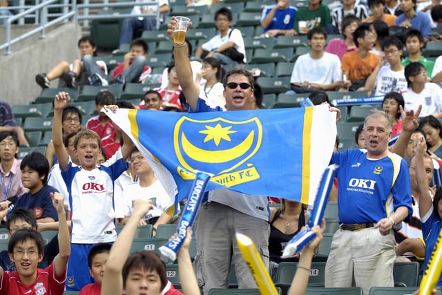 These Pompey fans soak up the atmosphere in the Hong Kong Stadium ahead of Pompey's game against Liverpool.





PICTURE: WILL CADDY (HK04-13)