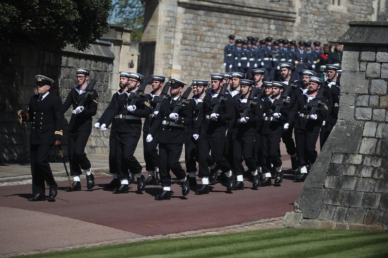 Members of Royal Navy marching at Windsor Castle before the procession of Prince Philip's coffin to St George's Chapel.