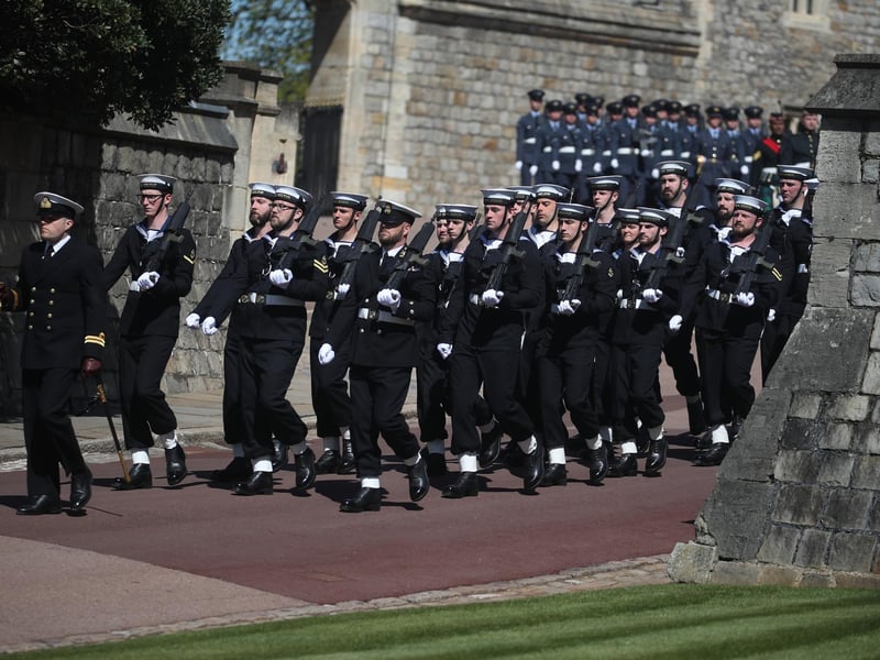 Members of Royal Navy marching at Windsor Castle before the procession of Prince Philip's coffin to St George's Chapel.
