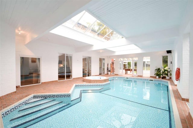 A standout feature of the property is its private heated swimming pool complete with a jacuzzi, and offers views out to the garden.
