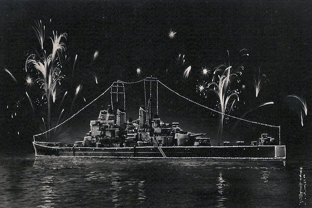 The fleet lit up for the Coronation fleet review at Spithead in 1953. HMS Vanguard.