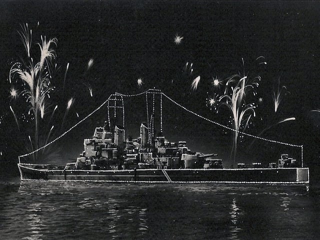 The fleet lit up for the Coronation fleet review at Spithead in 1953. HMS Vanguard.