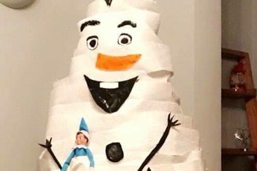 Dawn Glover had her elves wrap up the tree like Olaf from Frozen.