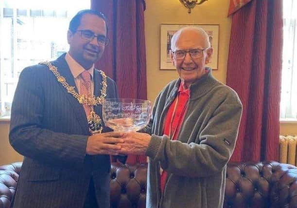 Nick receives his Volunteer of the Year award from the Mayor of Rotherham