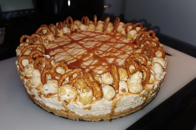 A salted caramel, popcorn and pretzel cheesecake by Lizi Amer.