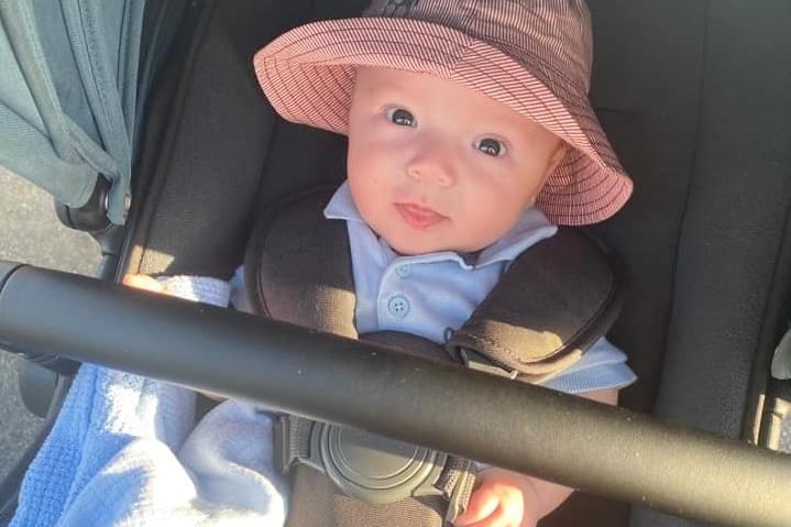 Elizabeth Jean posted this photo of an adorable baby wearing a sunhat.
