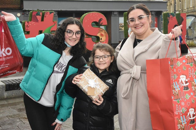 Stacey Mallin from Castletown along with Grace and Amelia get in some last minute shopping for presents for family and friends.