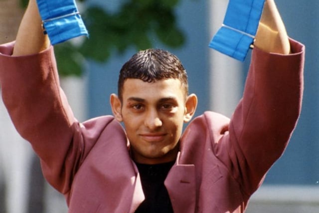 'Prince' Naseem Hamed holds aloft his belt after winning the European bantamweight title by beating Vincenzo Belcastro at Ponds Forge, Sheffield, on May 11, 1995