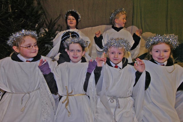 Pictured at Totley Hall Farm, Totley, Sheffield, where children from St Peters and St Pauls school, Haydey Hill, Chesterfield were performing a Nativity play in the farm barn in 2008. Seen LtoR are Angels  Frount Lorna Scott, Emily Wainwright, Hollie Cannon, and Rebecca Wordall. Back are Cameron Forie, and Charles Barlow.
