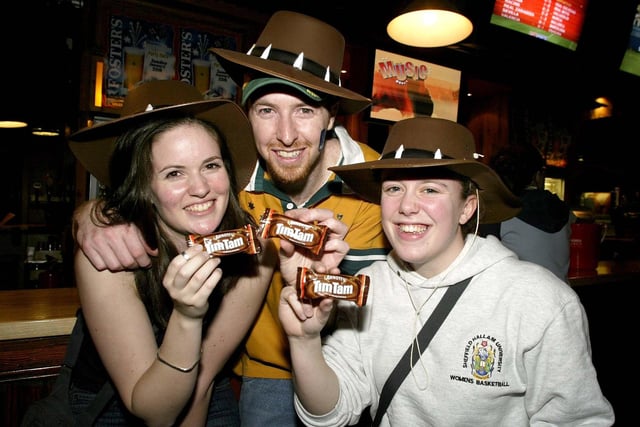 Sheffield will be celebrating Australia Day this year by joining a world record attempt on the Tim Tam Slam to be staged at Walkabout, Carver Street.  Locals will be among the 30,000 people across the country to simultaneously dunk and suck the renowned Australian biscuit. Pictured are Angeline Bicker, Jamie Davidson, Katie Vaines in 2004