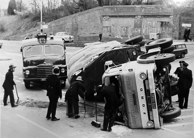 Truck accident Southwick Hill
A lorry that has tipped over at the junction of London Road and Southwick Road, Cosham in 1969.