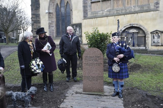 Hannah Winton (4), Bob the dog, and City Tours Edinburgh actors Dave Severn and Caroline Walker, attend a ceremony to mark the anniversary of the death of Greyfriars Bobby in January 2018.
