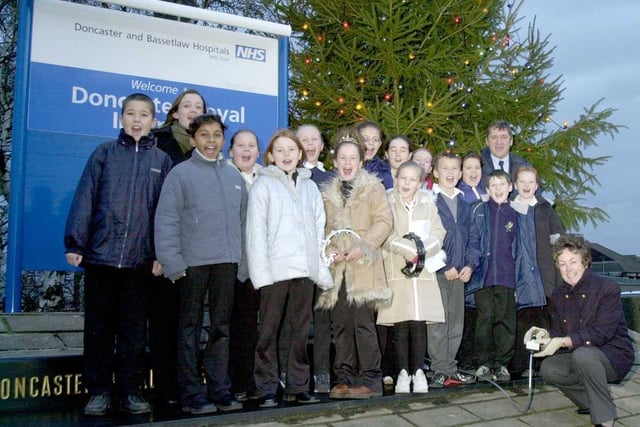 Pupils and staff of Park Primary School, Doncaster, with Doncaster and Bassetlaw NHS Trust Chairman, Margaret Cox, switch on the Christmas tree lights in 2002