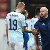 Scotland manager Steve Clarke (right) and Oli McBurnie shake hands after the final whistle during the UEFA Nations League Group 2, League B match at City Arena, Trnava, Slovakia.