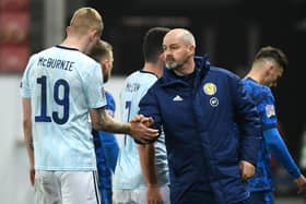 Scotland manager Steve Clarke (right) and Oli McBurnie shake hands after the final whistle during the UEFA Nations League Group 2, League B match at City Arena, Trnava, Slovakia.