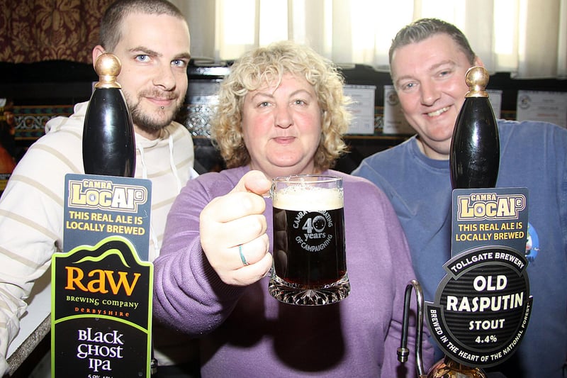 Chesterfield CAMRA Chairman Jane Lefley launches the Chesterfield Market 'Battle of the Beers' with Sam Madin, left, and Phil Smith.