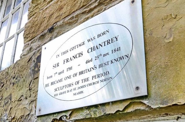 A plaque records that the property was Sir Francis Chantrey's birthplace - he was commissioned to produce sculptures of four living monarchs, George III, George IV, William IV, and Queen Victoria.